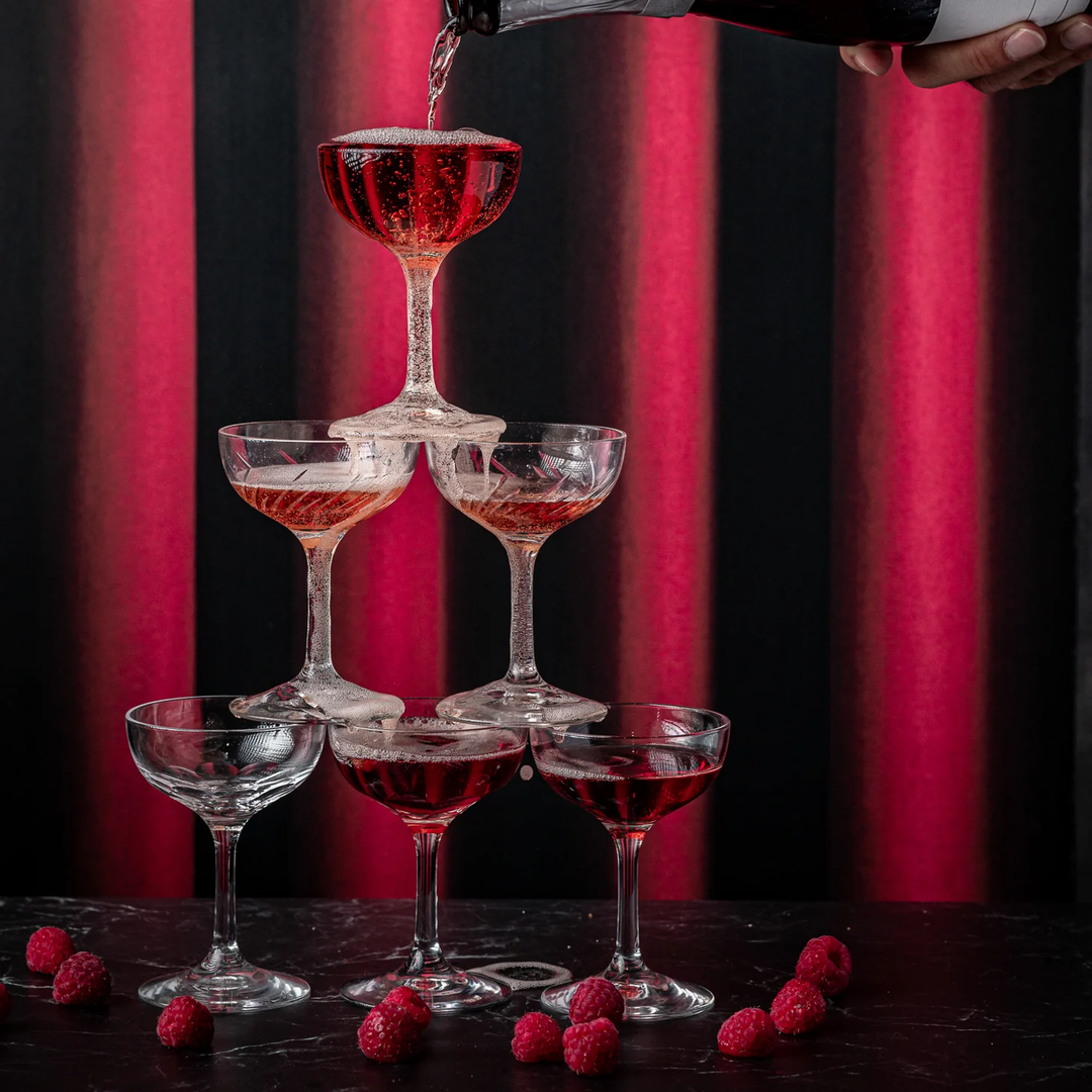 RazzGasm poured into a tower of coupe glasses